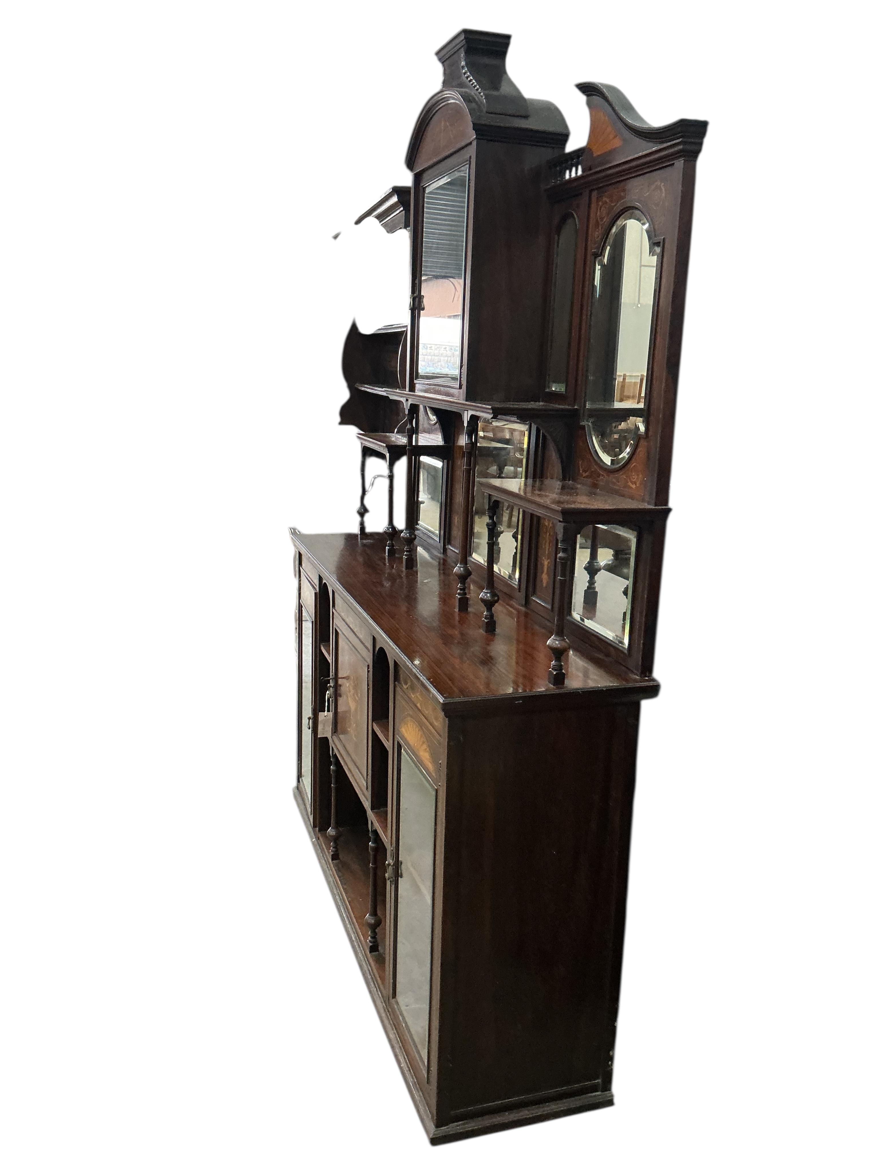 An Edwardian marquetry inlaid rosewood side cabinet, width 153cm, depth 41cm, height 208cm